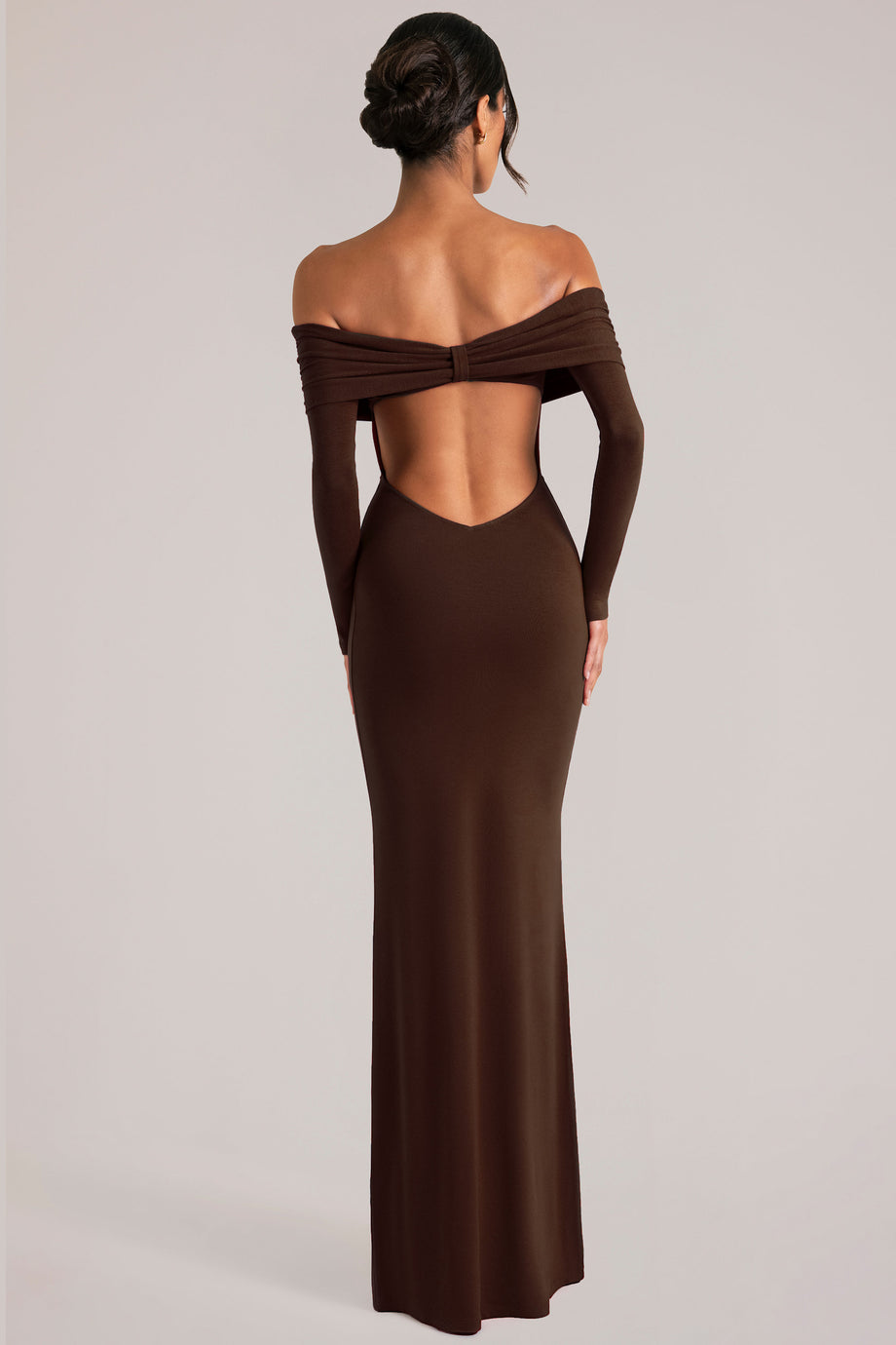 Oh Polly model Yasmin wearing the Depny Maxi Dress in Chocolate Brown Modal fabric perfect for summer weddings