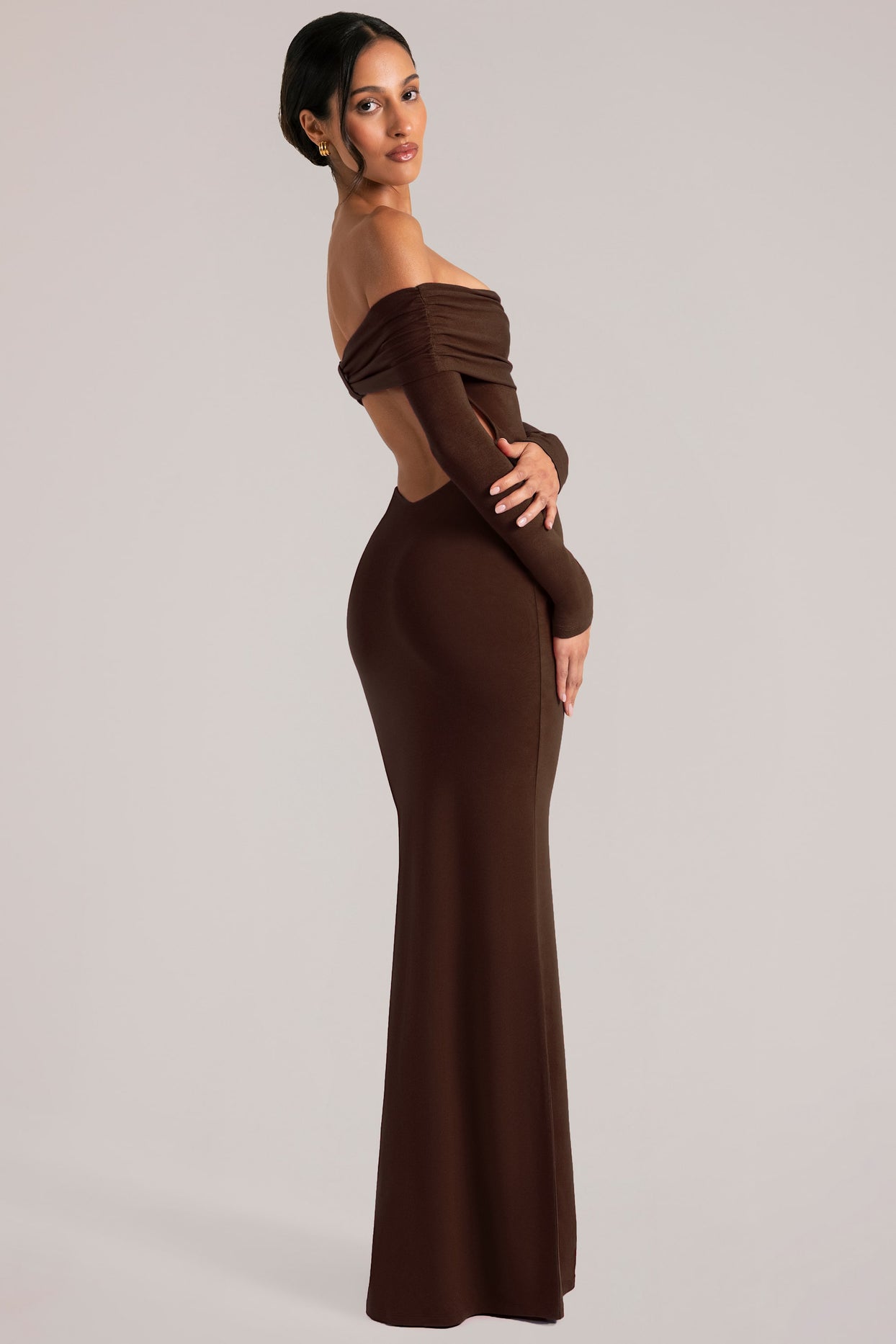 Oh Polly model Yasmin wearing the Depny Maxi Dress in Chocolate Brown Modal fabric perfect for summer weddings