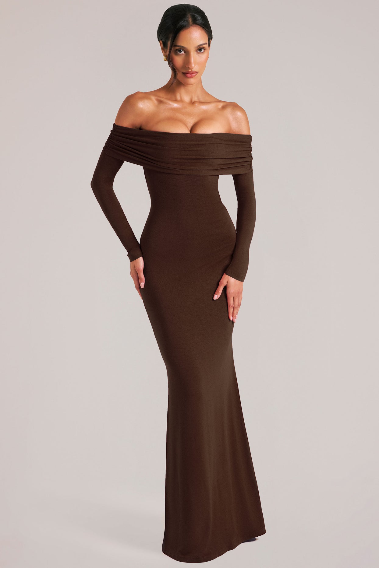 Oh Polly model Yasmin wearing the Depny Maxi Dress in Chocolate Brown Modal fabric perfect for summer weddings