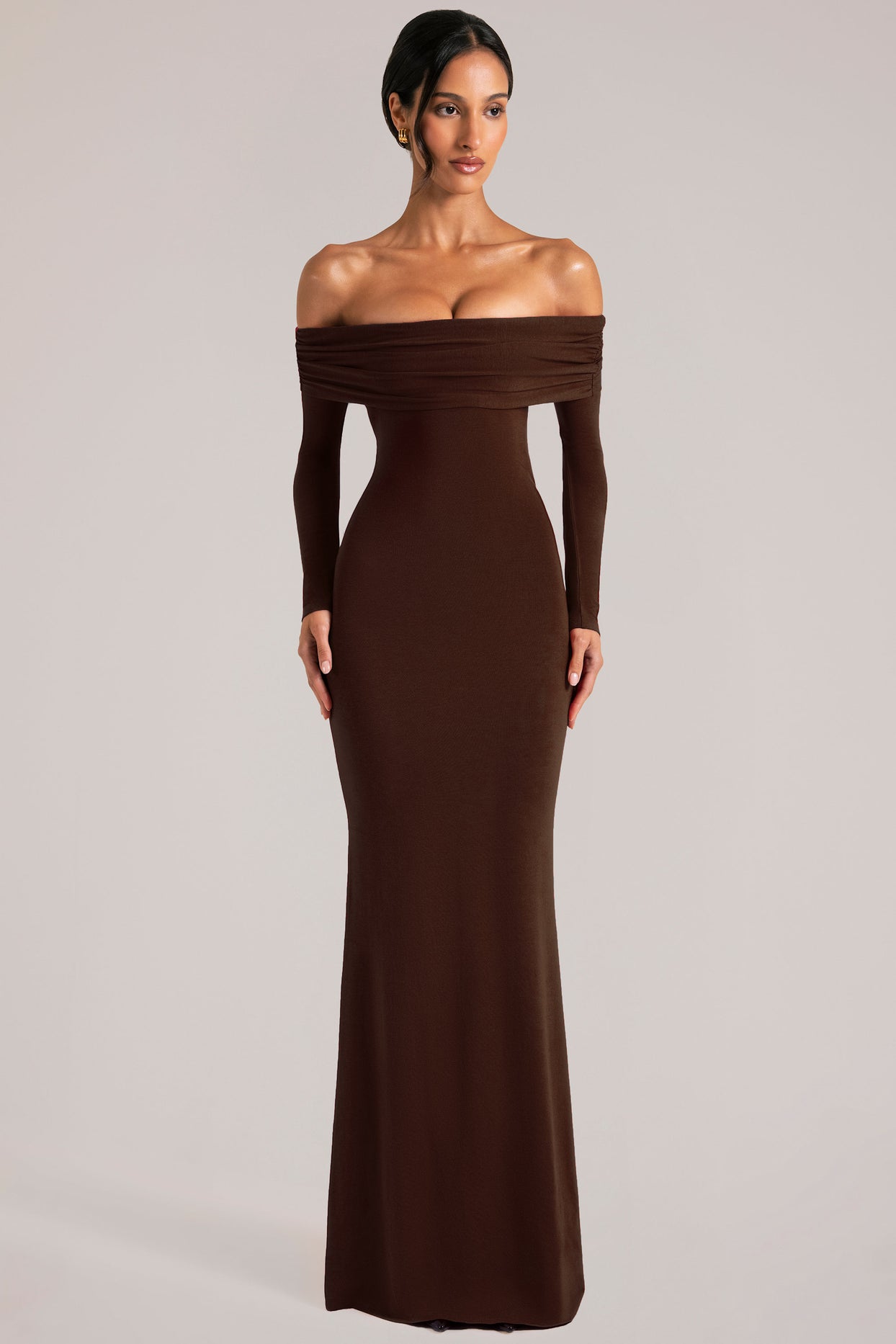 Oh Polly model Yasmin wearing the Depny Maxi Dress in Chocolate Brown Modal fabric perfect for summer weddings