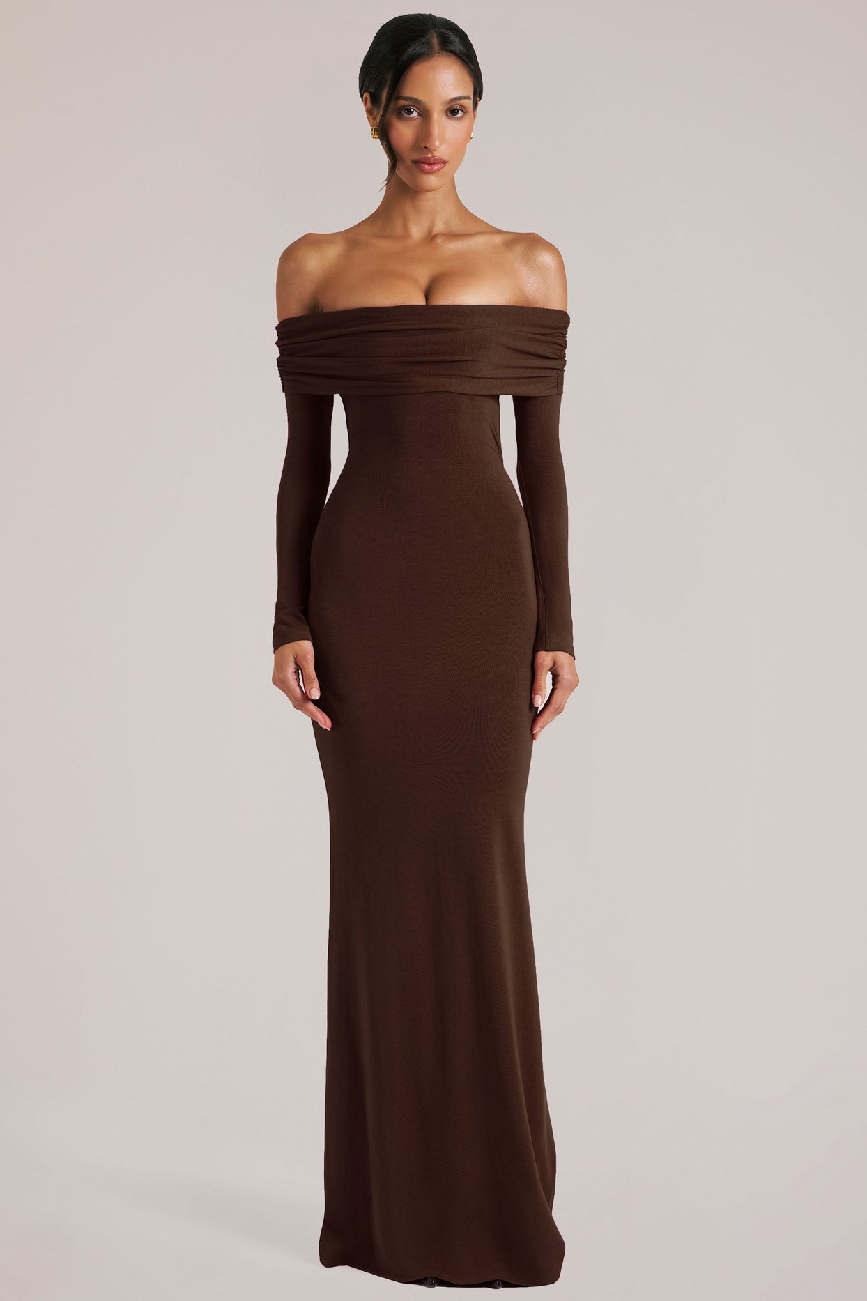 Oh Polly model Yasmin wearing the Depny Maxi Dress in Chocolate Brown Modal fabric perfect for summer weddings