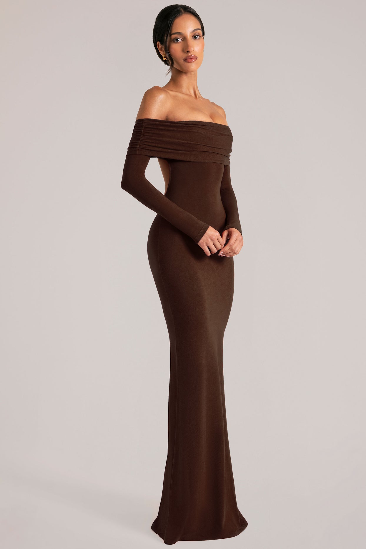 Oh Polly model Yasmin wearing the Depny Maxi Dress in Chocolate Brown Modal fabric perfect for summer weddings