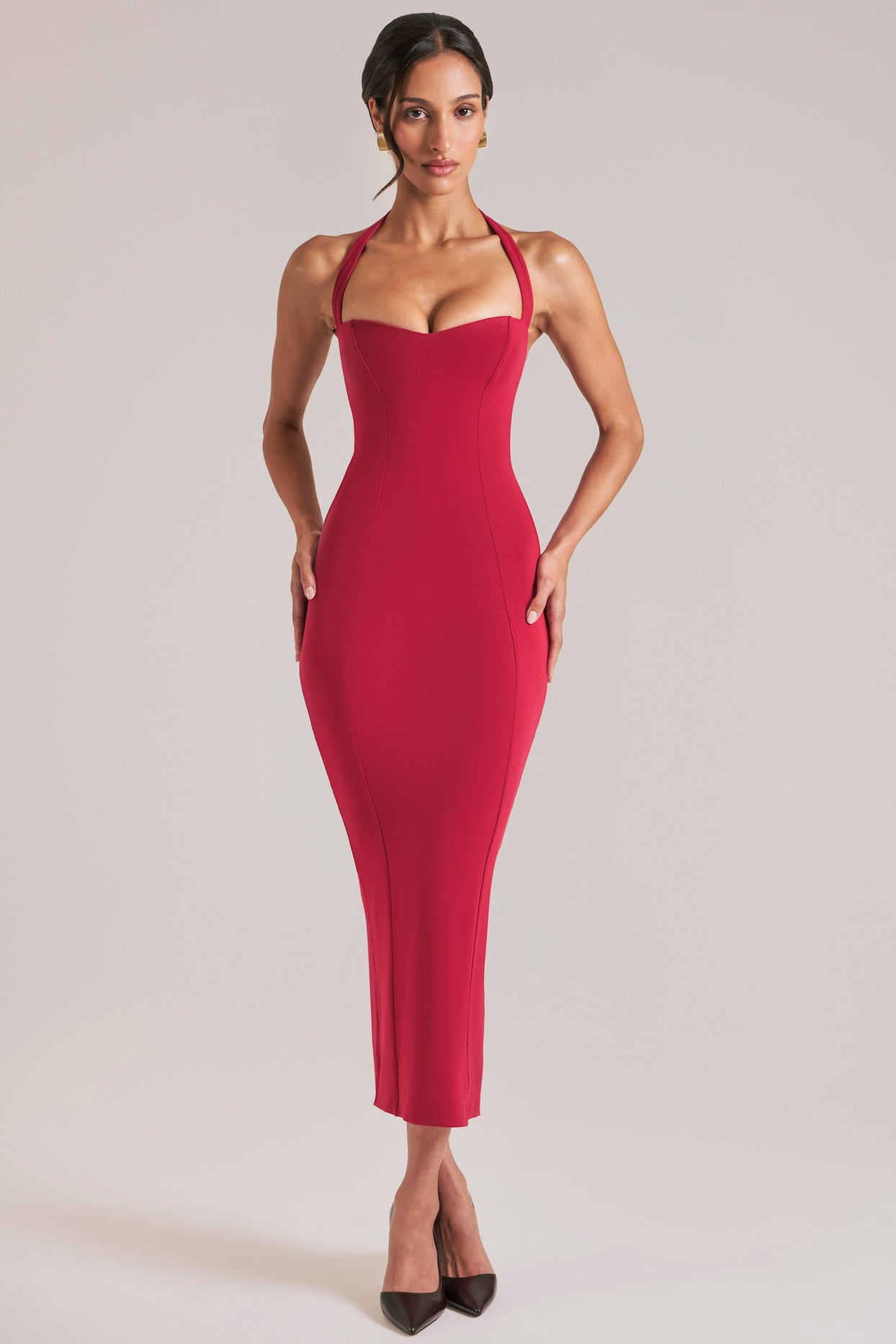 Oh Polly model Yasmin wearing the Landen Midi Dress in Cherry Red Modal fabric perfect for summer date night