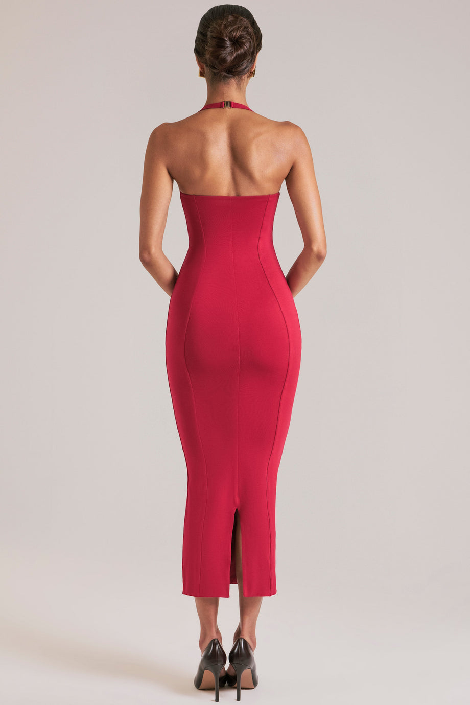 Oh Polly model Yasmin wearing the Landen Midi Dress in Cherry Red Modal fabric perfect for cocktail party style