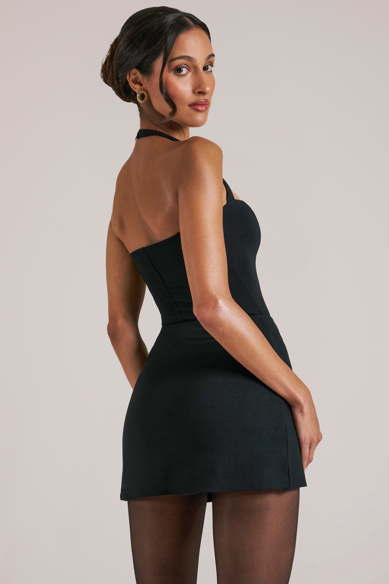 Oh Polly model Yasmin wearing the Vita Tops in Black Modal fabric perfect for city strolls