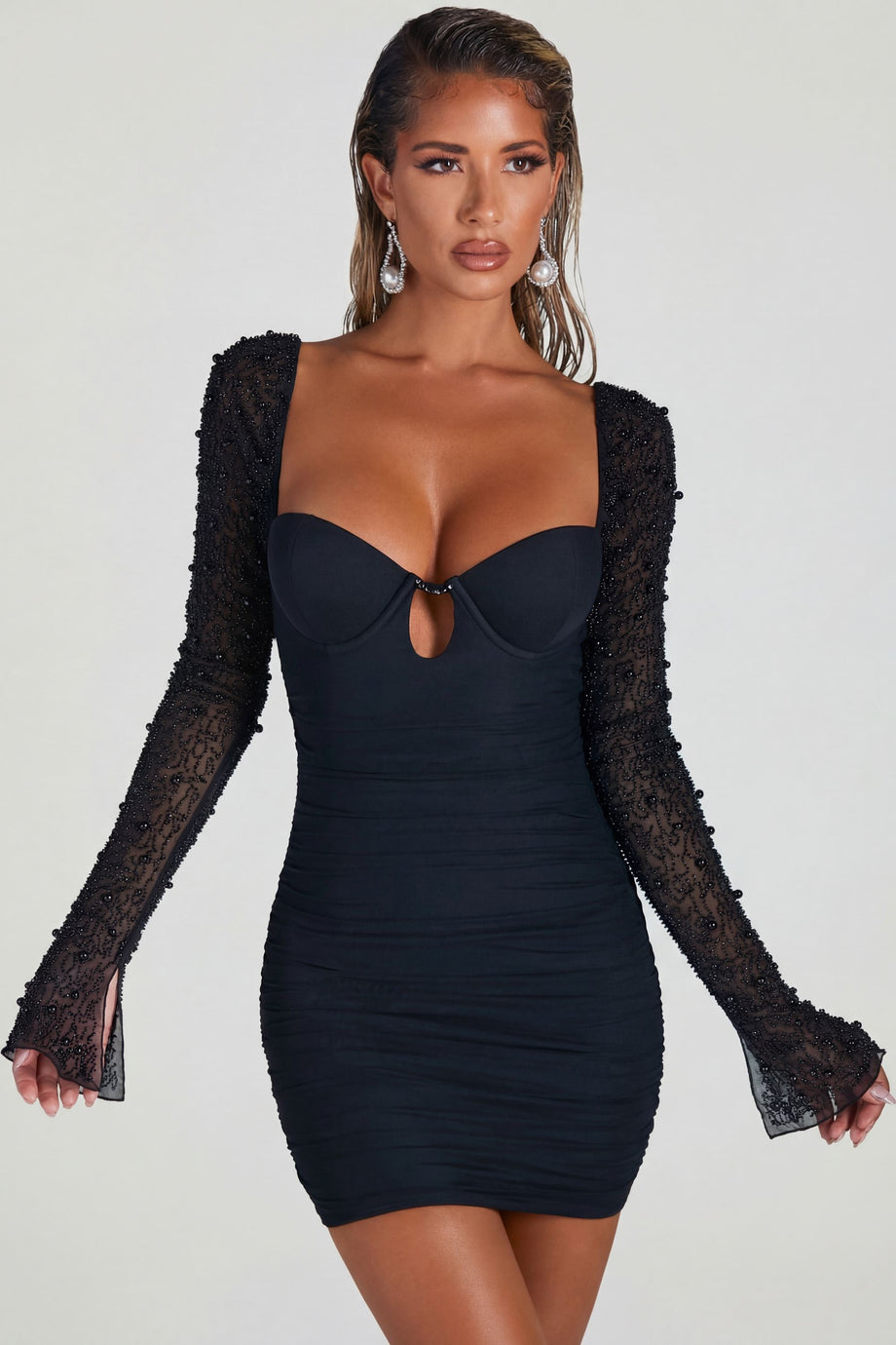 Oh Polly's Sierra Skye wearing the Attention Please Mini Dress in Black Embellished, Mesh fabric perfect for a night out