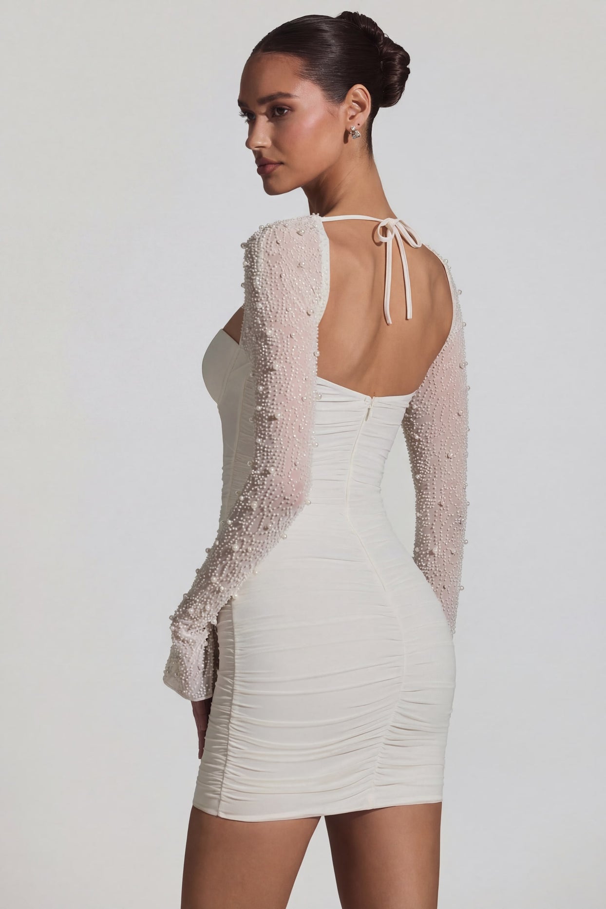 Oh Polly's Priscilla wearing the St Germain Mini Dress in White Embellished, Mesh fabric perfect for bridal shower events