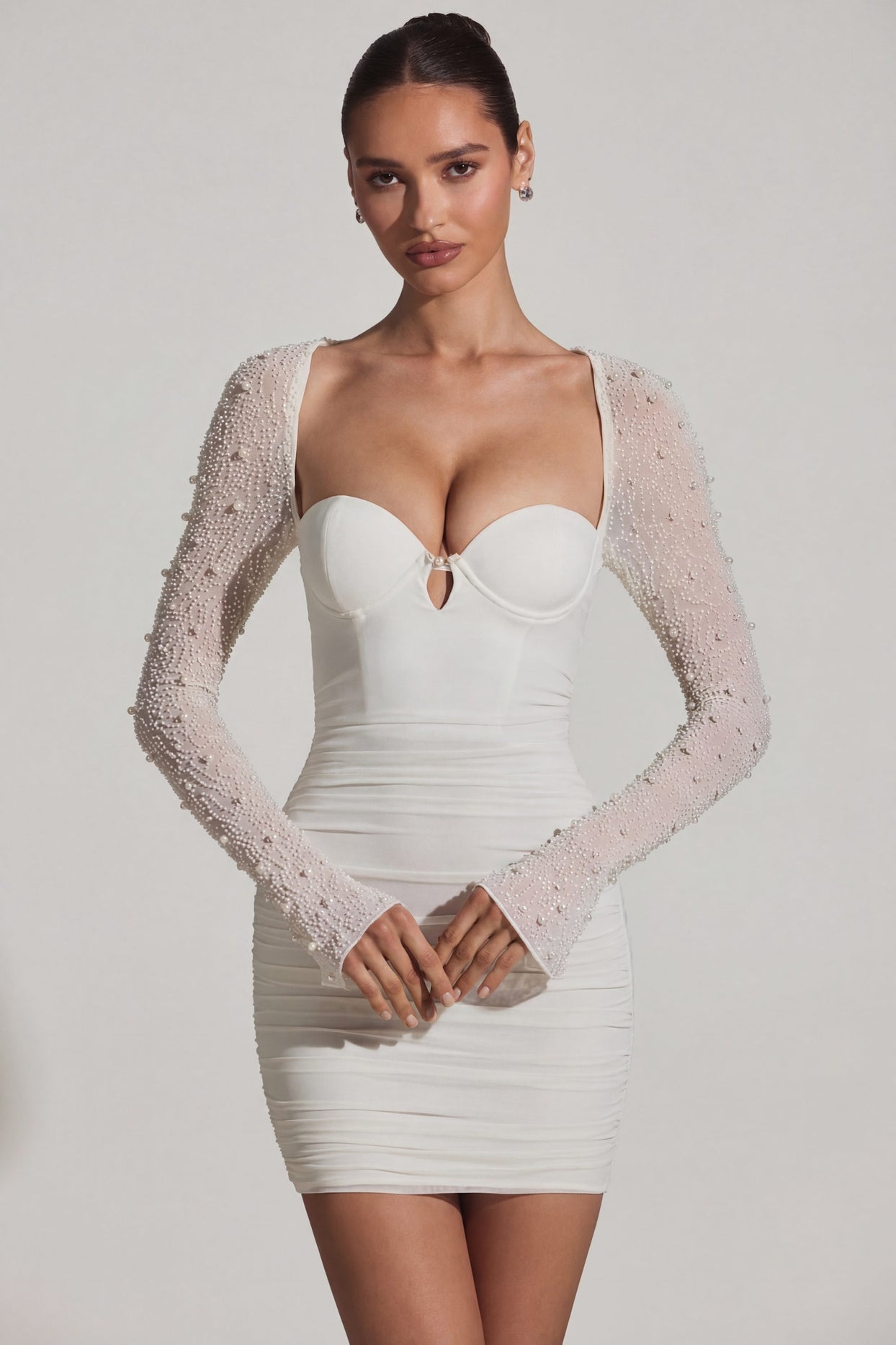 Oh Polly's Priscilla wearing the St Germain Mini Dress in White Embellished, Mesh fabric perfect for birthday celebrations