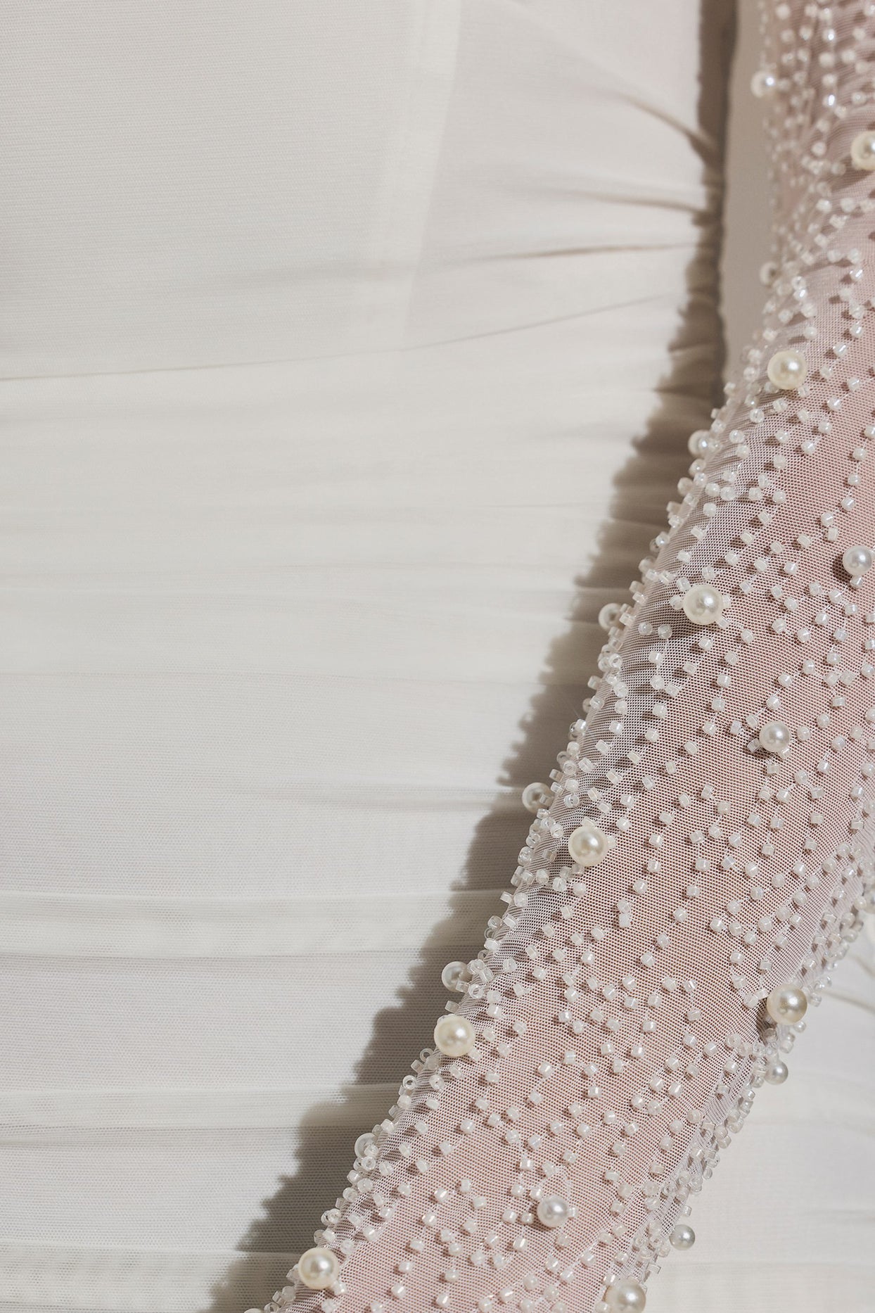 Oh Polly's Priscilla wearing the St Germain Mini Dress in White Embellished, Mesh fabric perfect for elegant date nights