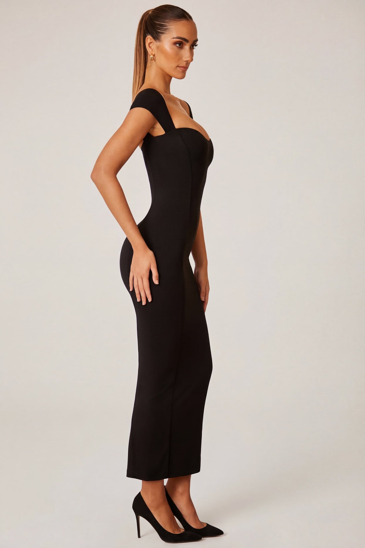 Oh Polly's Priscilla wearing the Dolcezza Maxi Dress in Black Modal fabric perfect for romantic dinner dates