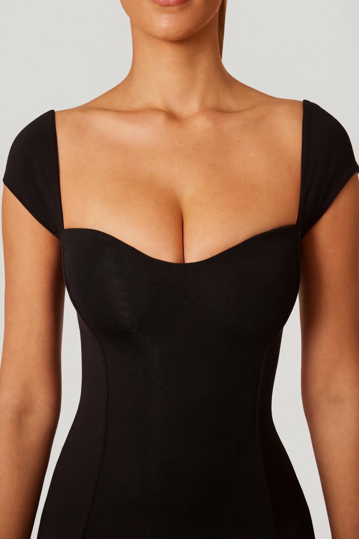 Oh Polly's Priscilla wearing the Dolcezza Maxi Dress in Black Modal fabric perfect for romantic dinner dates