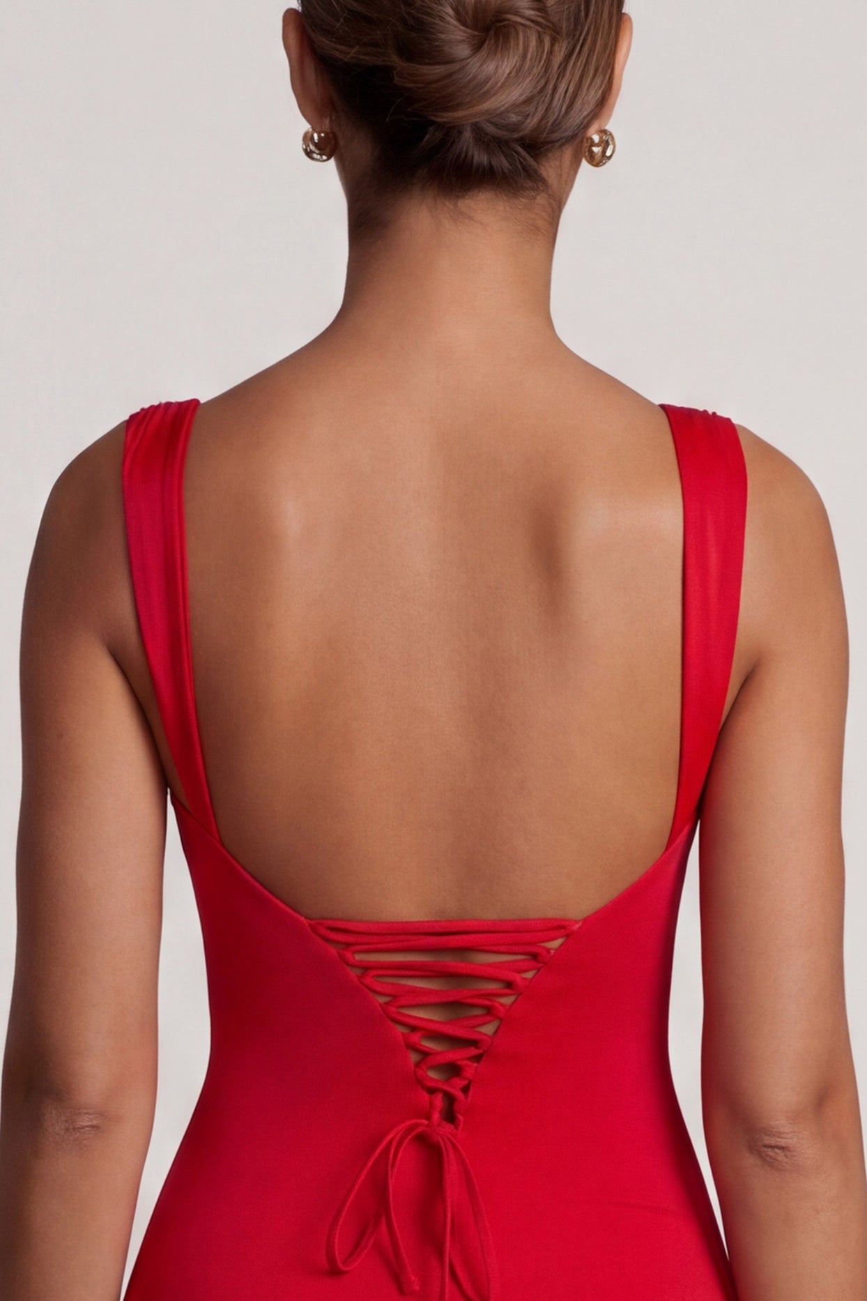 Oh Polly's Priscilla wearing the Violetta Mini Dress in Red Lycra fabric perfect for a night out