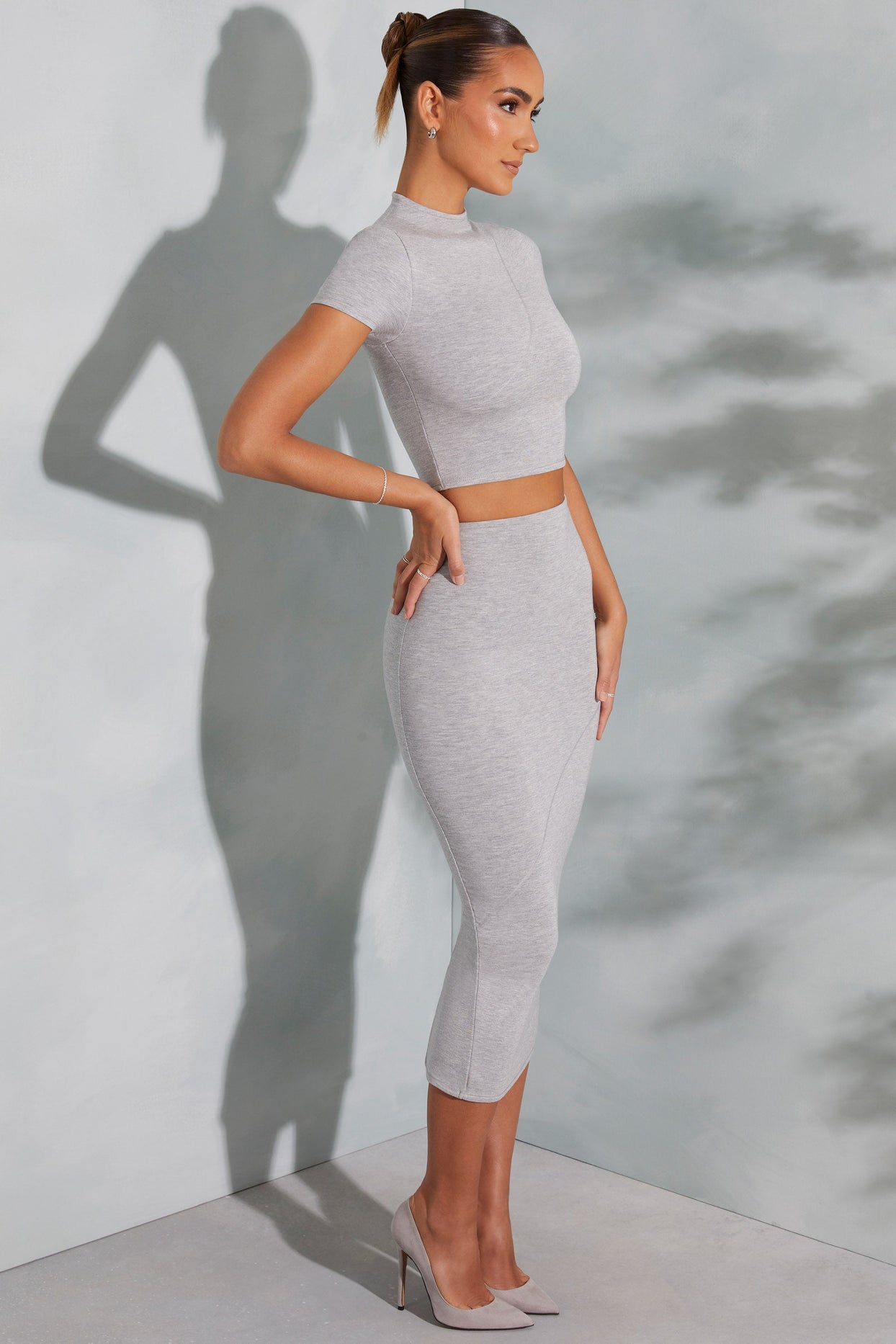 Contrast Stitch Turtleneck Crop Top in Marled Grey