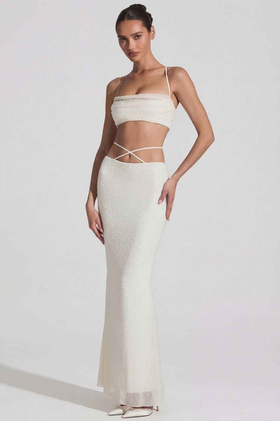 Oh Polly's Arbenita wearing the Pisa Crop Top in Ivory Embellished fabric perfect for summer parties