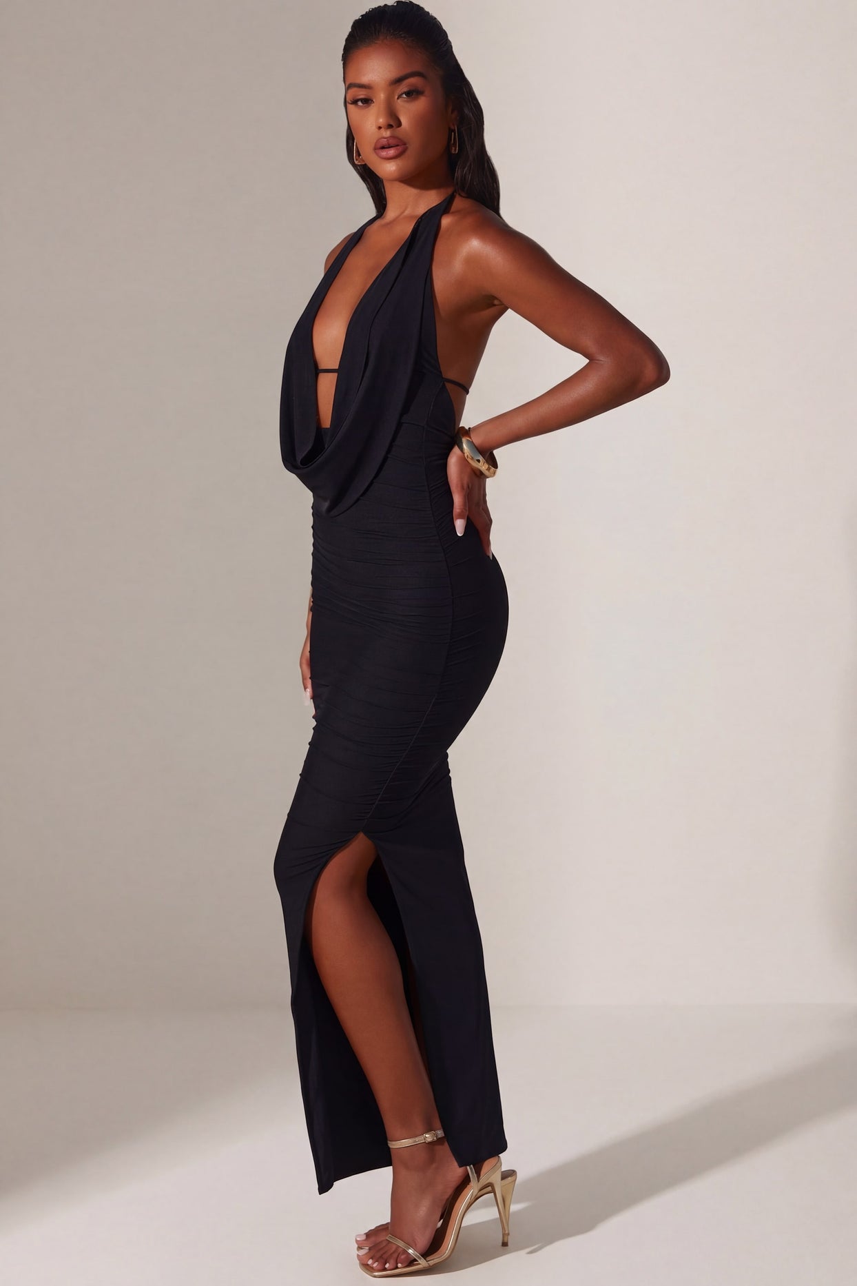 Oh Polly's Yarelis wearing the Mariposa Maxi Dress in Black Mesh fabric perfect for romantic date nights