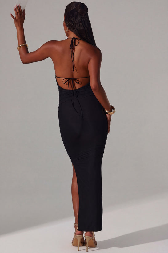 Oh Polly's Yarelis wearing the Mariposa Maxi Dress in Black Mesh fabric perfect for elegant evening events