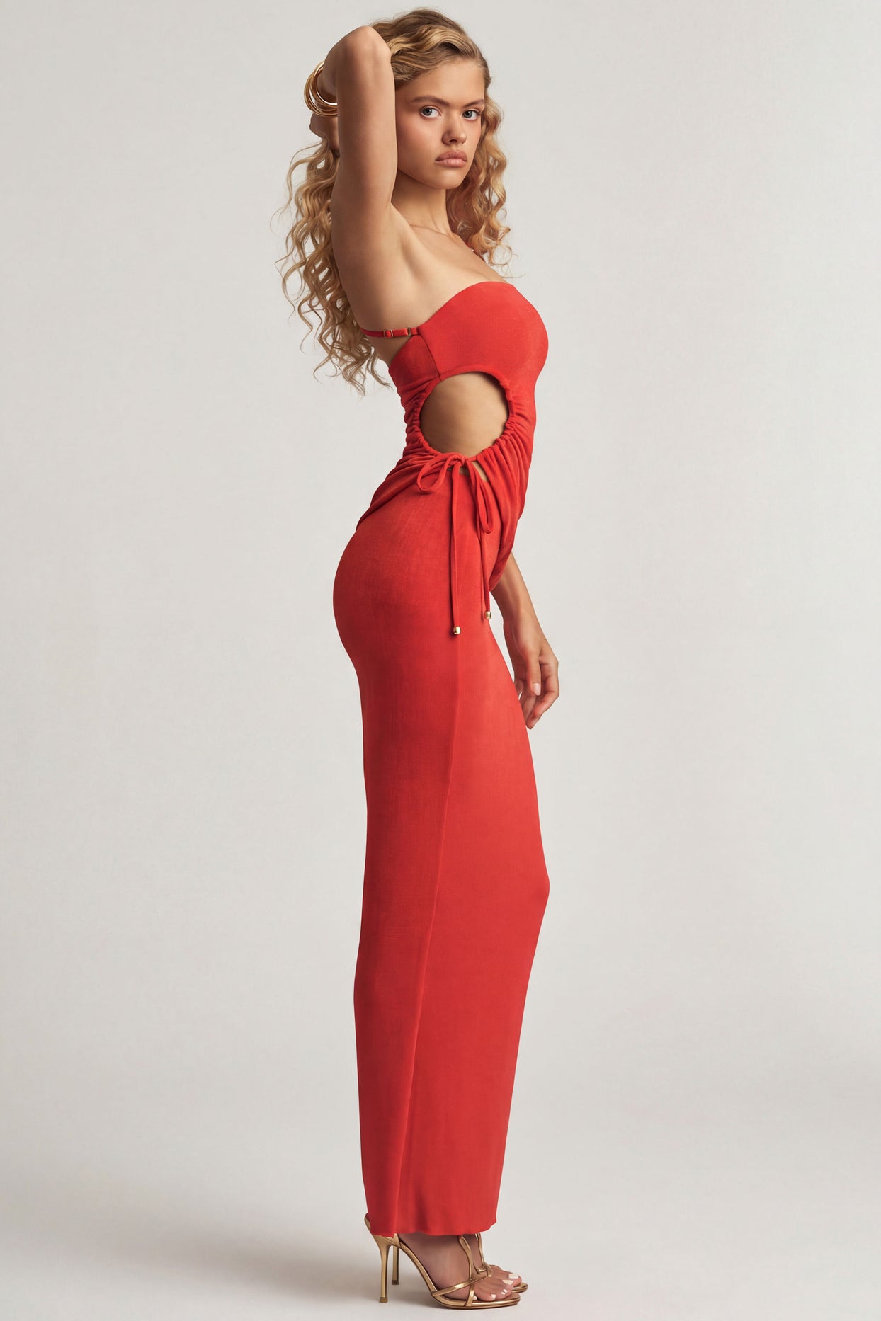 Oh Polly's Juliana Nulu wearing the Elena Maxi Skirt in Chilli Red Textured Jersey fabric perfect for holiday getaways