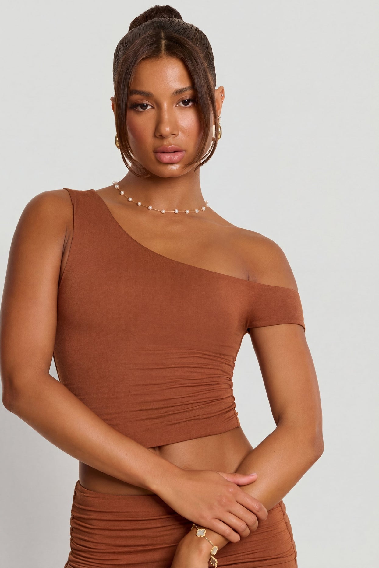 Oh Polly's Kiele wearing the Anona Regular Trousers in Chestnut Brown Modal fabric perfect for date night style