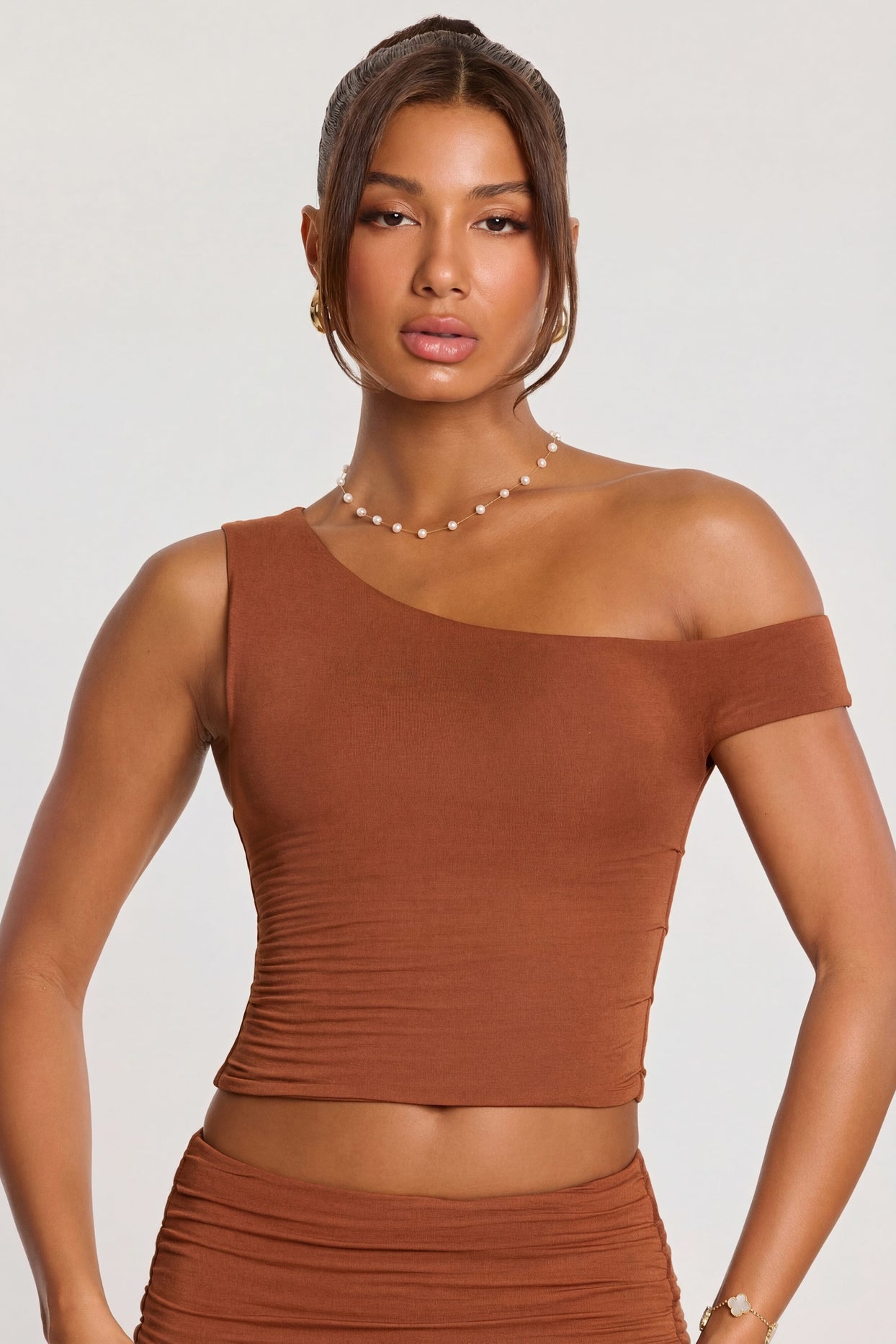 Oh Polly's Kiele wearing the Anona Regular Trousers in Chestnut Brown Modal fabric perfect for business casual events