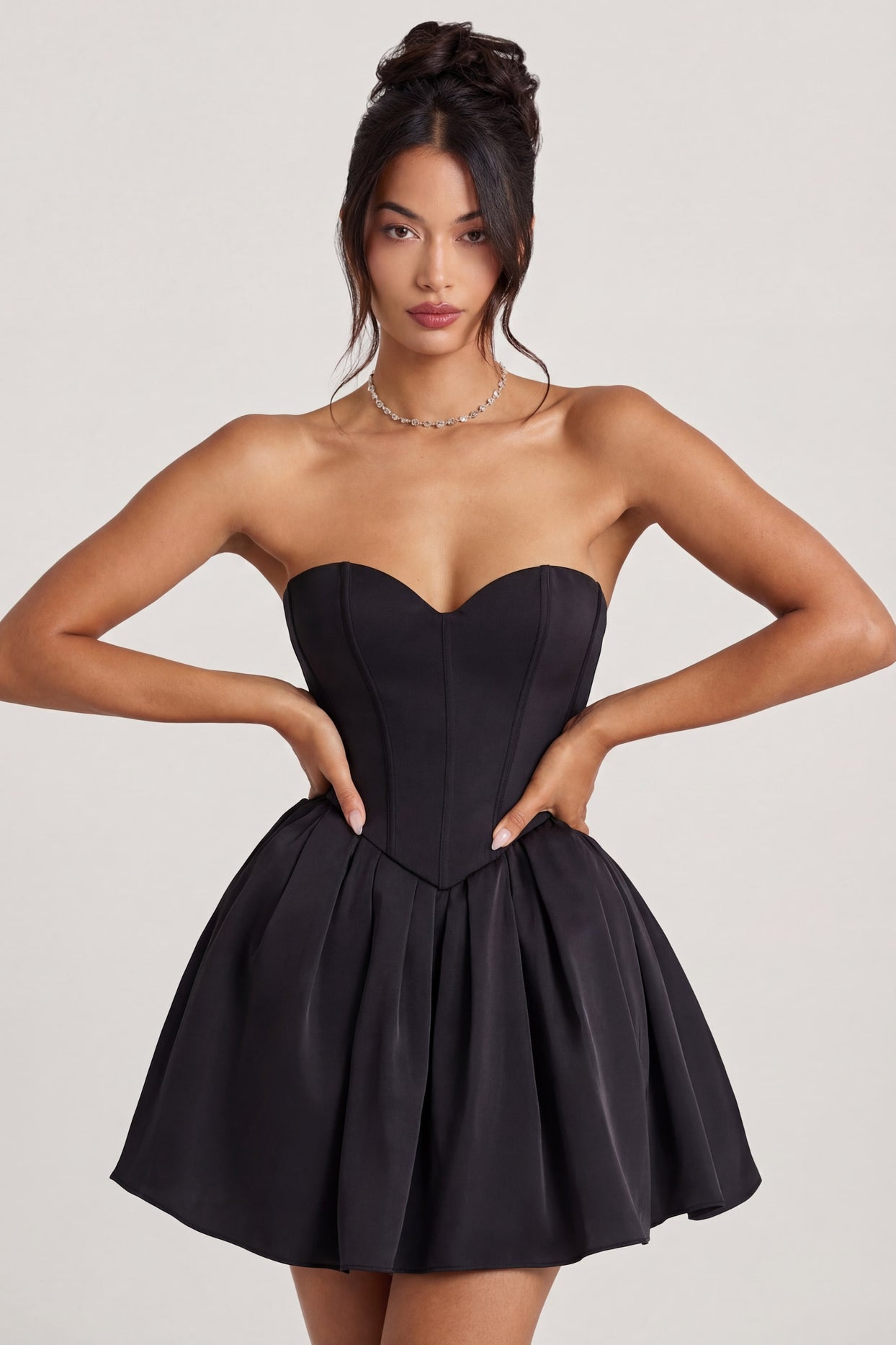 Oh Polly's Rona wearing the Emeline Mini Dress in Jet Black Tulle fabric perfect for date nights