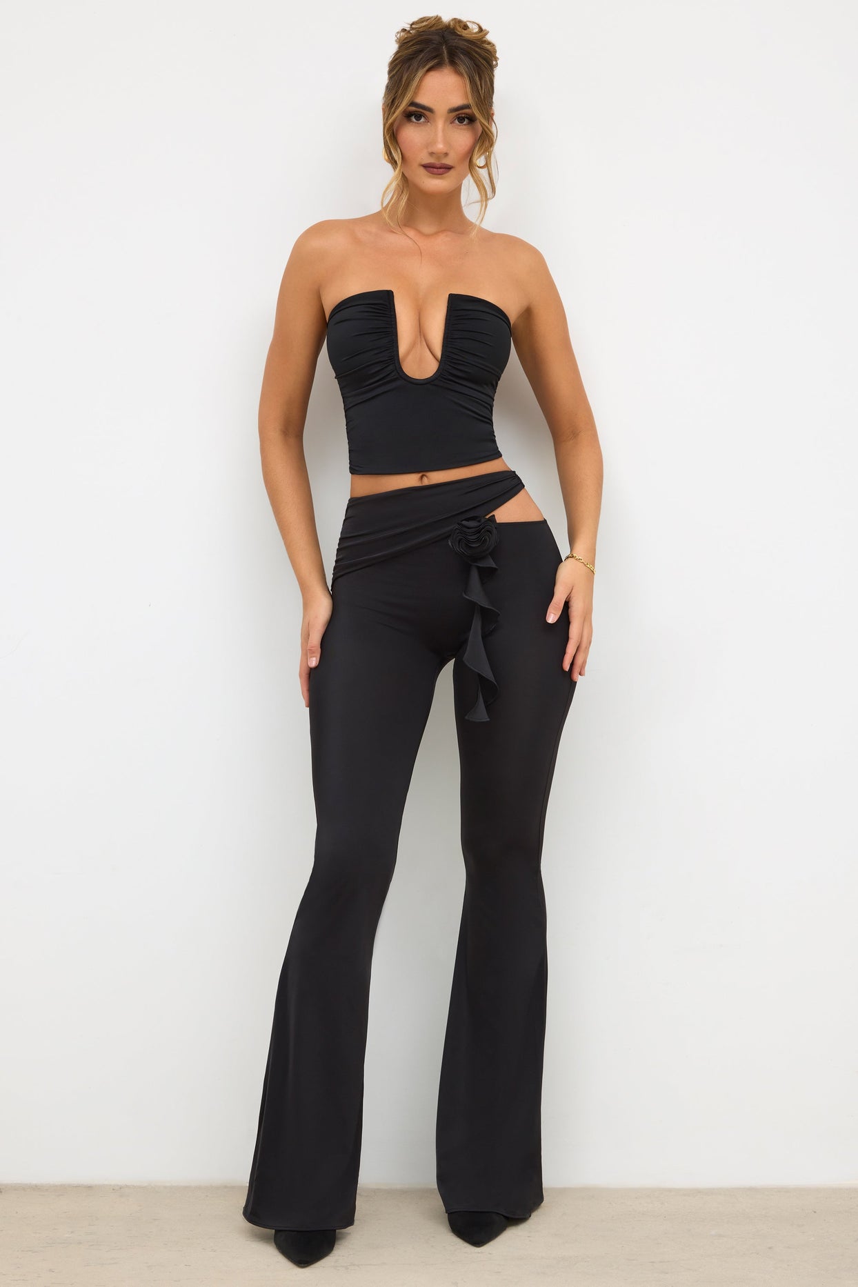 Angelika Tall Premium Jersey Rose Detail Mid-Rise Flare Trousers in Black |  Oh Polly