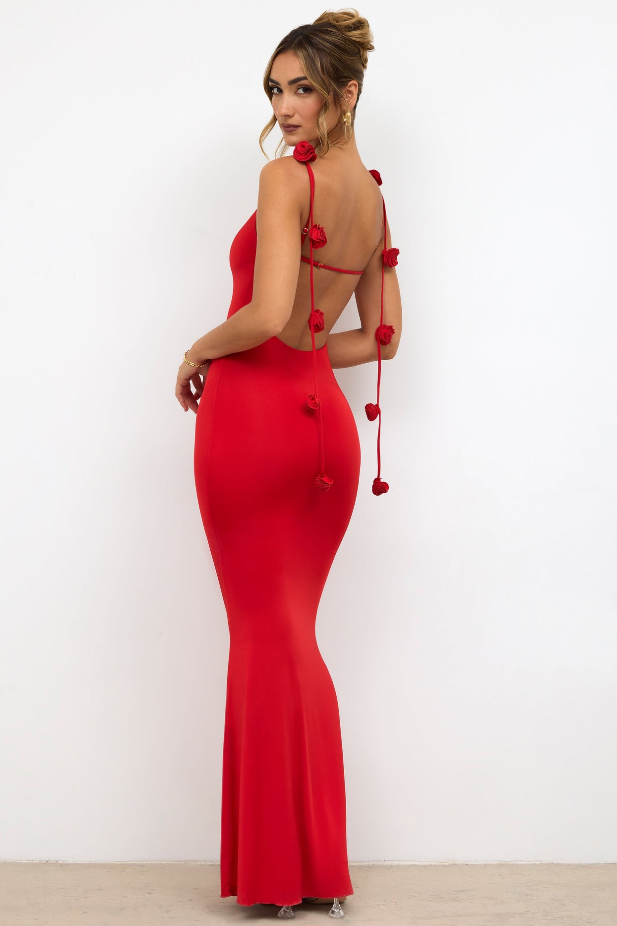Premium Photo  Fashionable Femme Fatale in a Slinky Gown