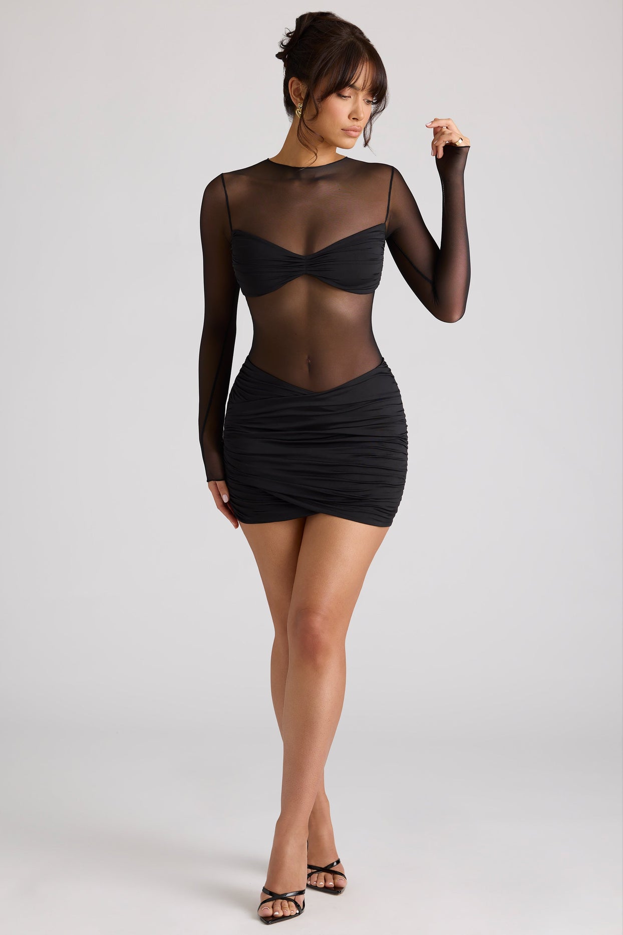Essie Sheer Panelled Long Sleeve Mini Dress in Black | Oh Polly Essie Sheer Panelled Long Sleeve Mini Dress in Black | Oh Polly