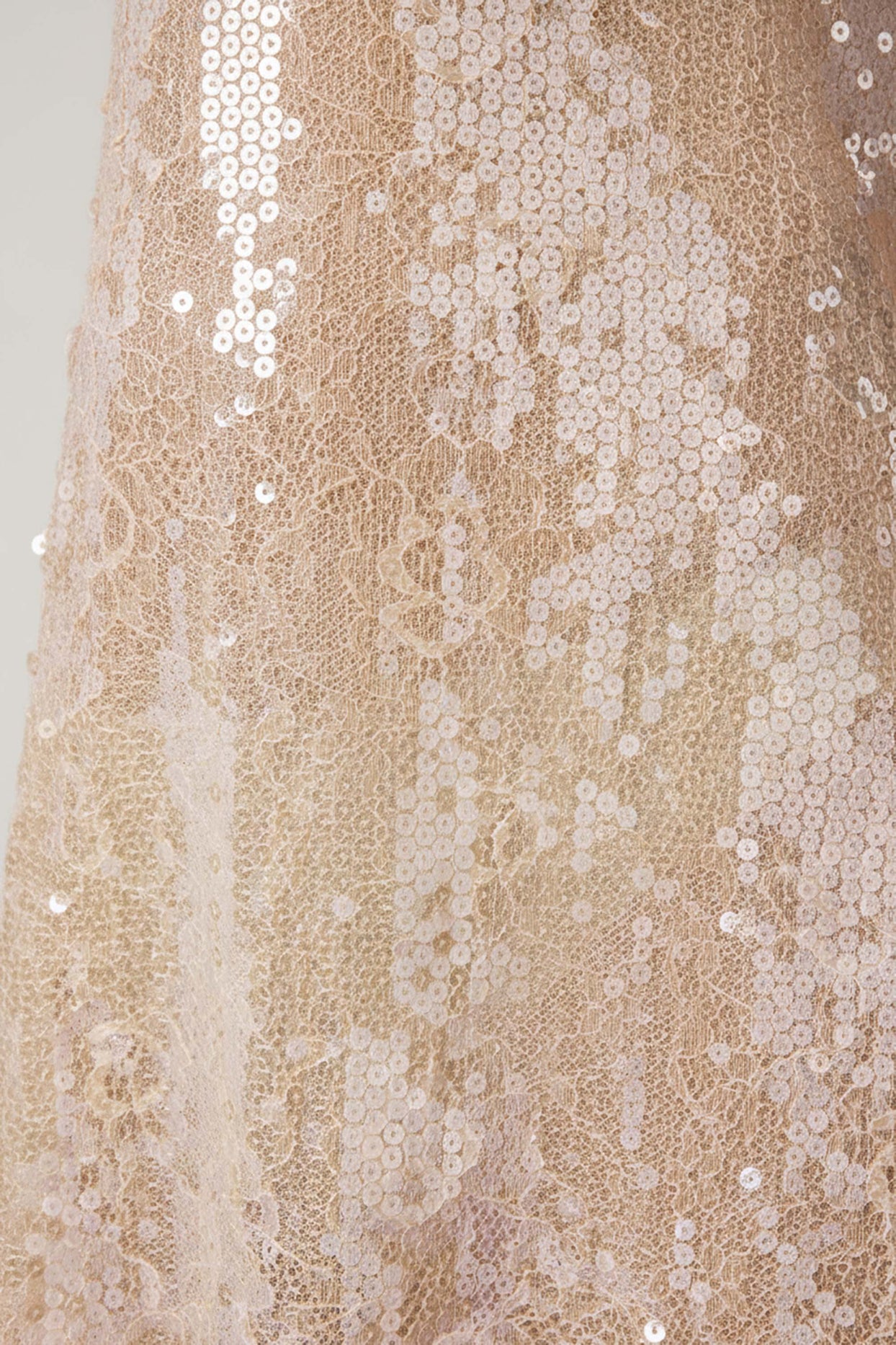 Oh Polly's Roberta wearing the Agnetha Mini Dress in Pale Peach Sequin, Lace fabric perfect for summer parties