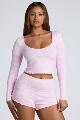 Long Sleeve Scoop Neck Pointelle Crop Top in Baby Pink