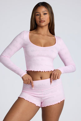 Long Sleeve Scoop Neck Pointelle Crop Top in Baby Pink