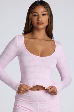 Long Sleeve Scoop Neck Pointelle Crop Top in Baby Pink