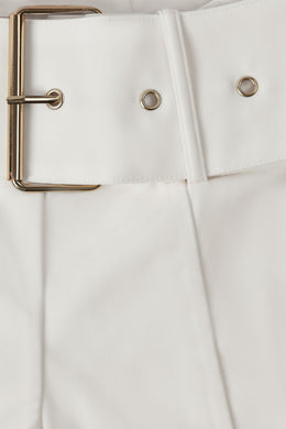 Petite Metallic Belted Mid-Rise Flared Trousers in Ivory