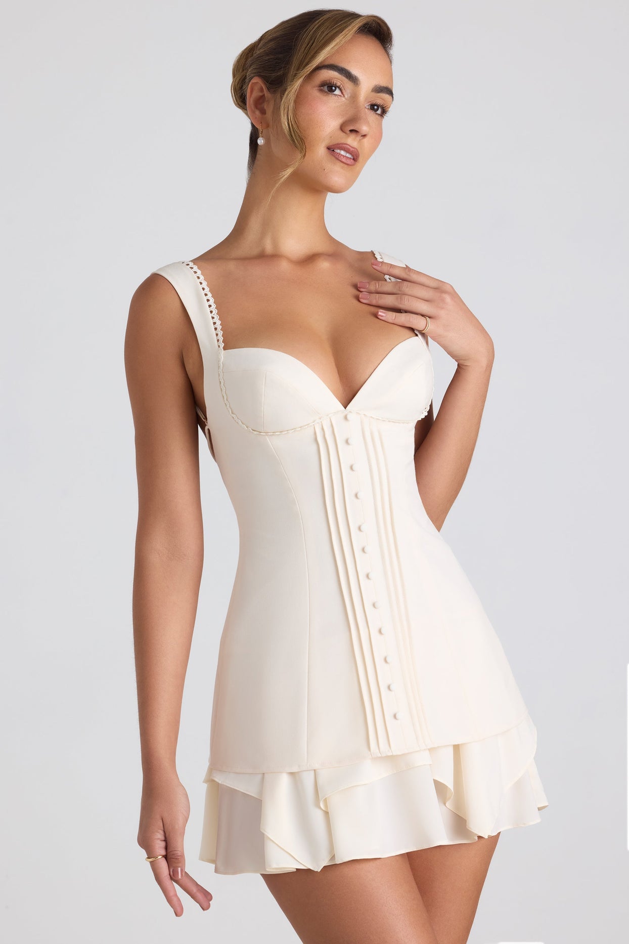 Ruffle-Trim Button-Detail Corset Mini Dress in Ivory Ruffle-Trim Button-Detail Corset Mini Dress in Ivory