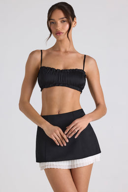 Ruffle-Trim Smocked Crop Top in Black