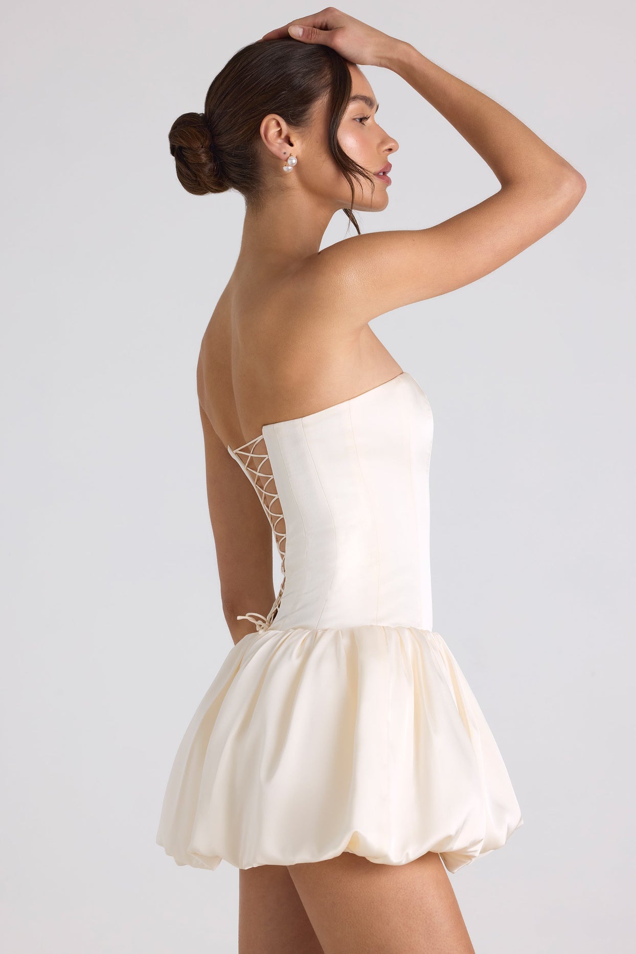 Fabiola Lace-Up Bubble Hem Corset Mini Dress in Ivory