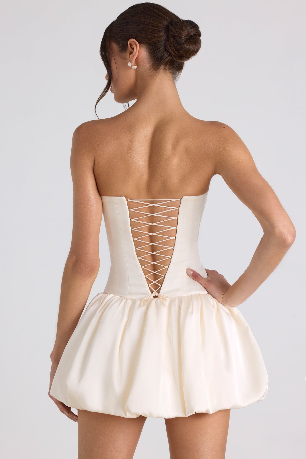 Lace-Up Bubble Hem Corset Mini Dress in Ivory