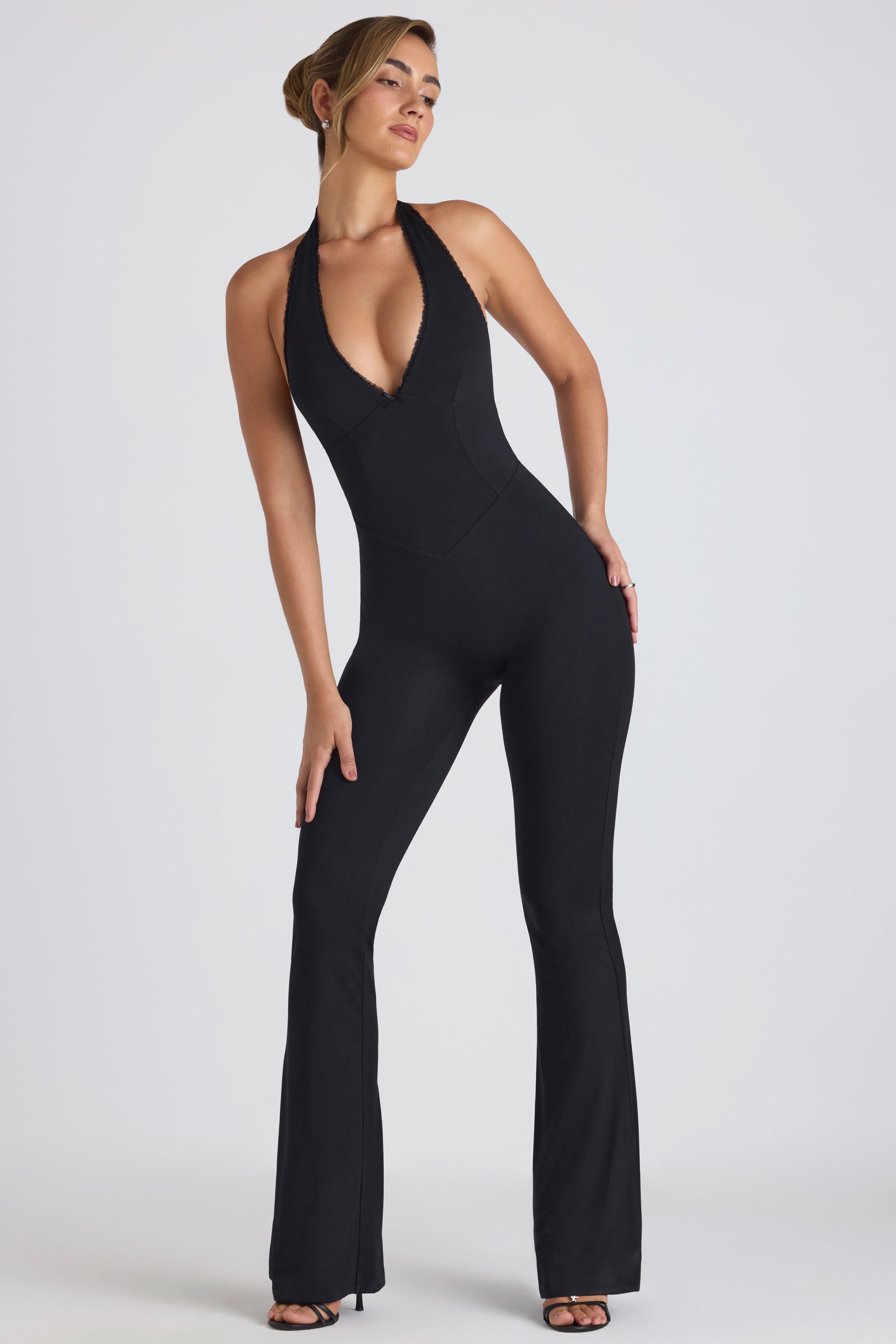 Pema Modal Lace Trim Cut Out Flared Jumpsuit in Black Oh Polly