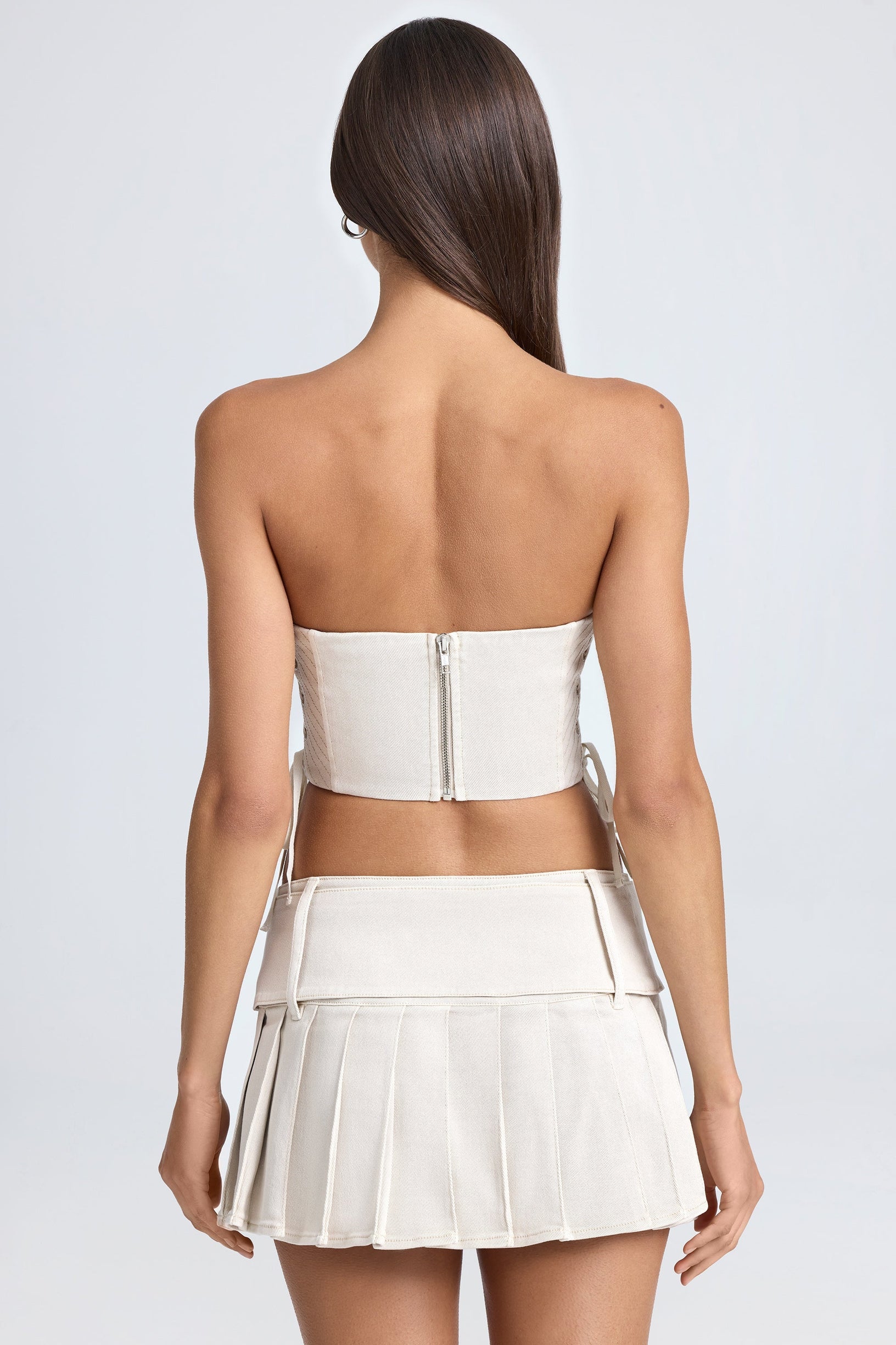 Belted Pleated Low-Rise Micro Mini Skirt in Ecru - 2