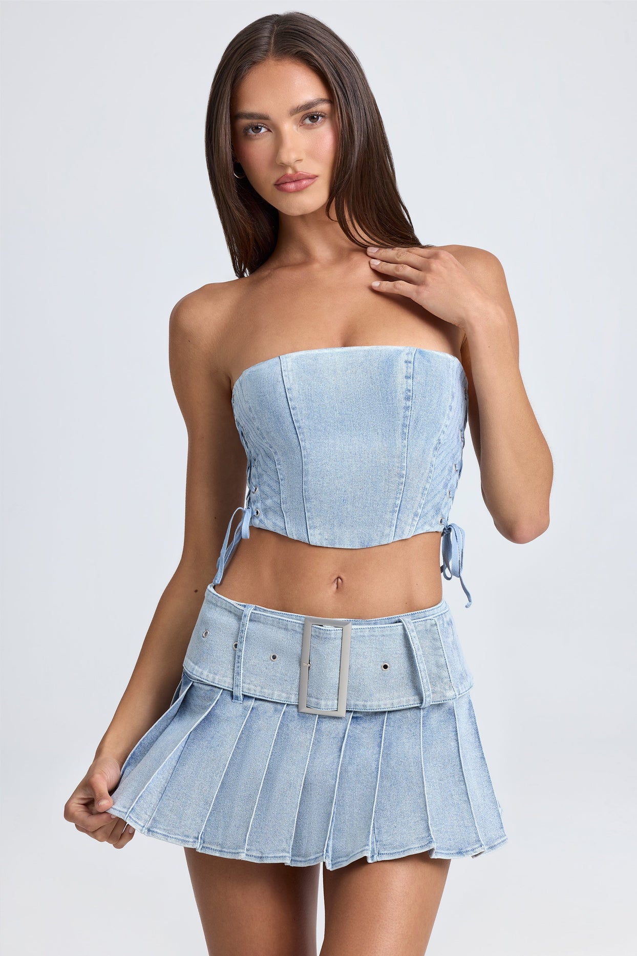 Belted Pleated Low-Rise Micro Mini Skirt in Light Blue Stonewash