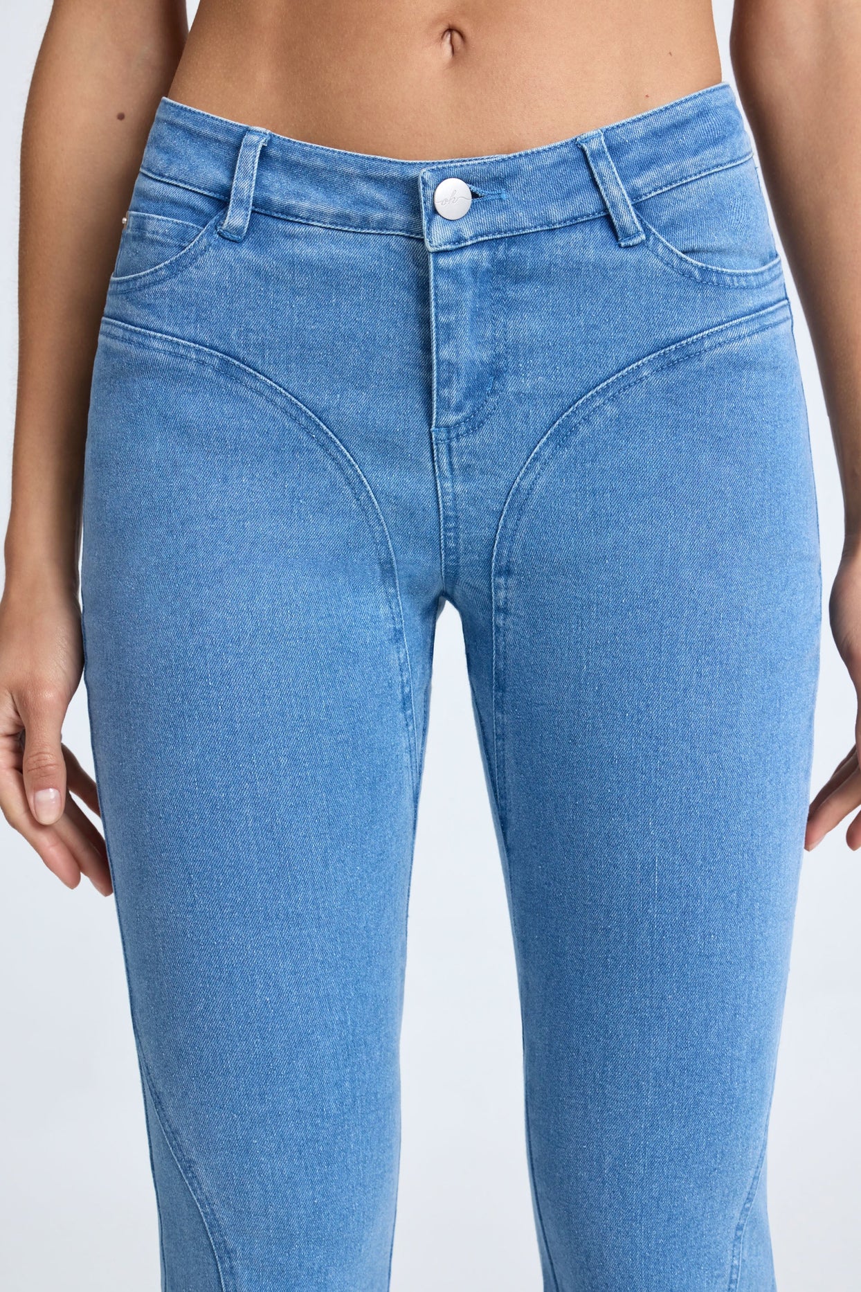 Petite Mid-Rise Flared Jeans in Mid Blue Stonewash