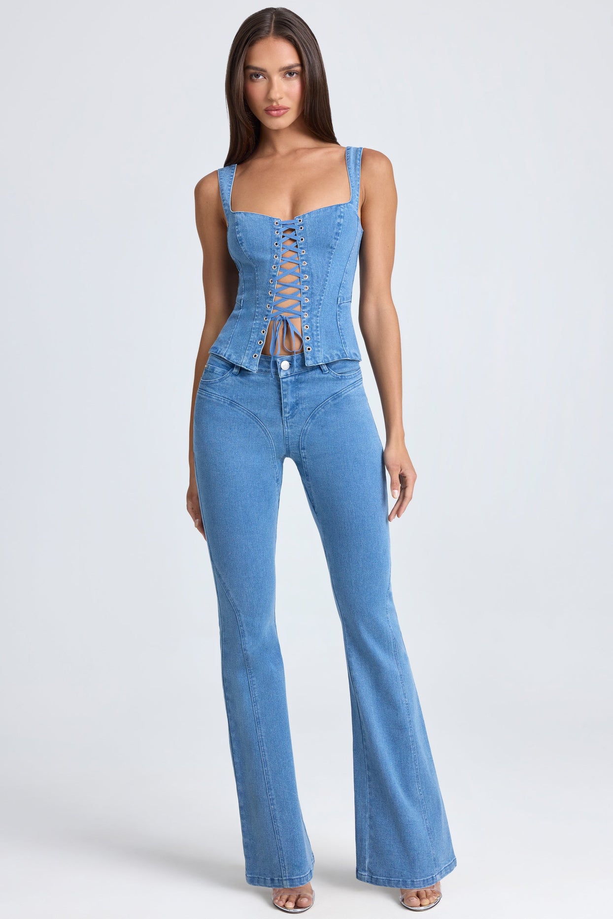 Petite Mid-Rise Flared Jeans in Mid Blue Stonewash