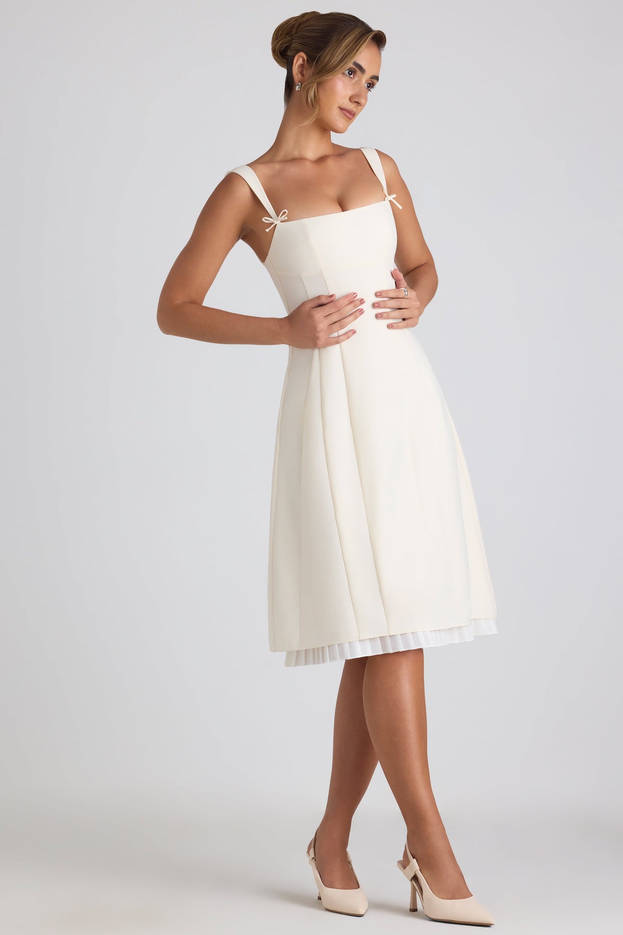 Bow-Detail Pleated A-Line Midi Dress in Ivory Bow-Detail Pleated A-Line Midi Dress in Ivory