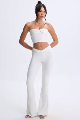 Petite Twist-Front Flared Trousers in White