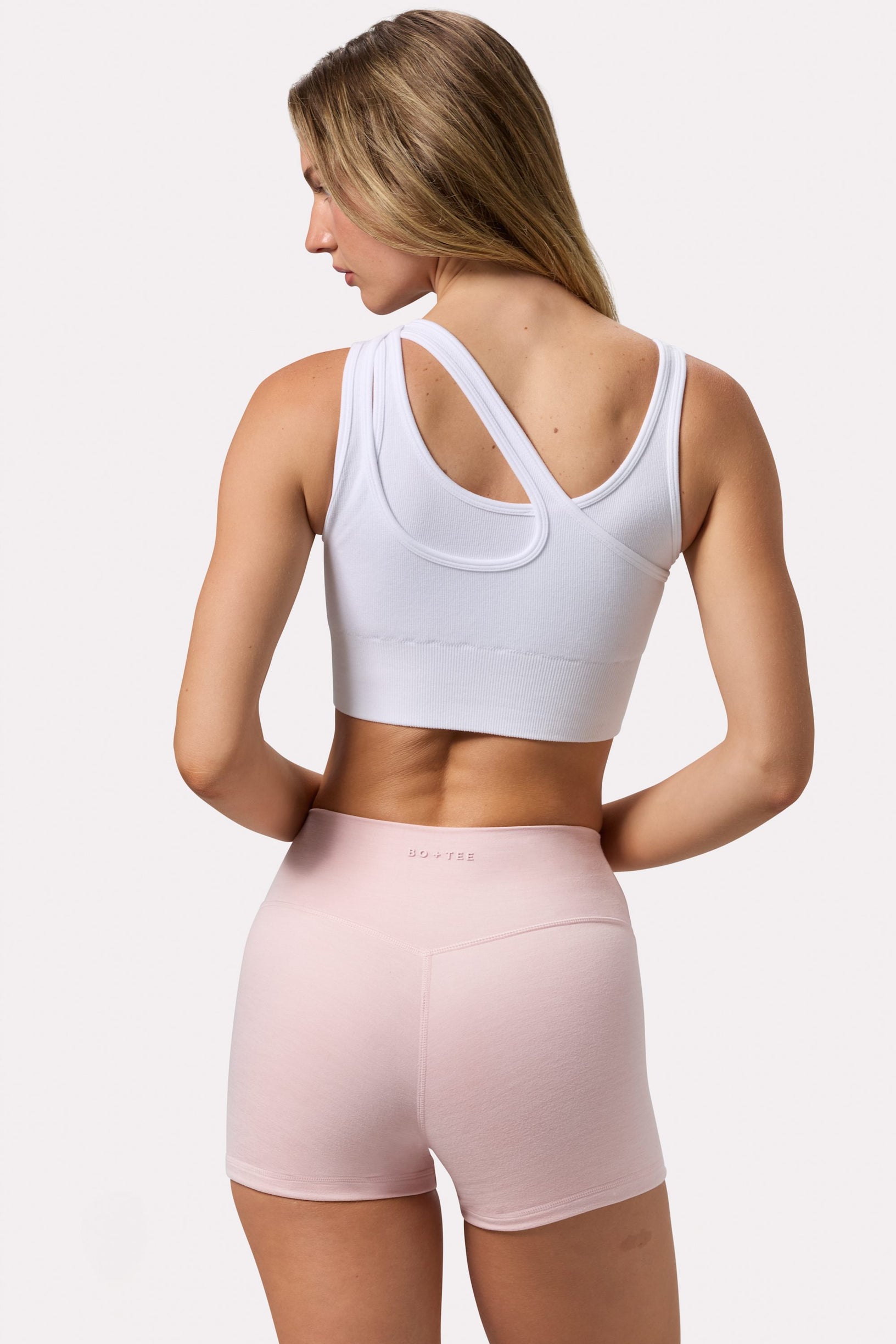Seamless Soft Rib Asymmetric Sports Bra in White - 2