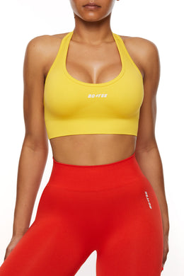 Halter Neck Sports Bra in yellow with red Seamless leggings