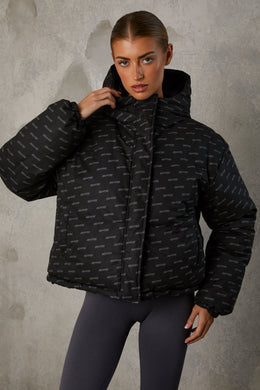 Reversible Hooded Puffer Jacket in Black