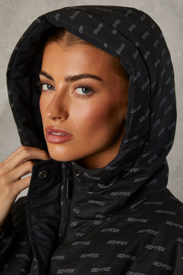 Reversible Hooded Puffer Jacket in Black