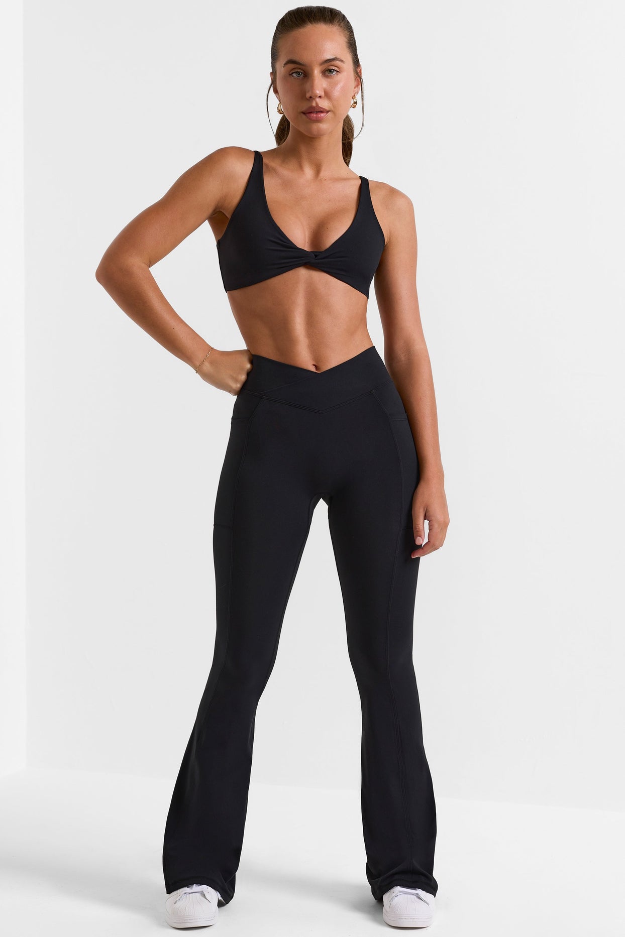 Match Cross Waistband Flare Pocket Leggings in Black | Oh Polly