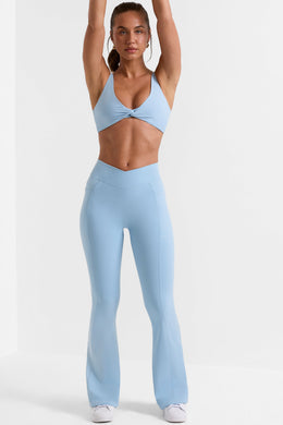 Cross Waistband Flare Pocket Leggings in Ice Blue