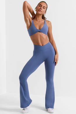 Cross Waistband Flare Pocket Leggings in Slate Blue